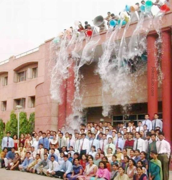 funny group photo pouring water from the top, 