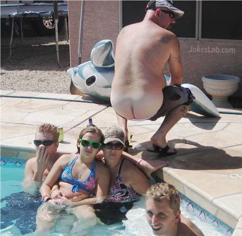 funny family photo in swimming pool, naked buttocks 