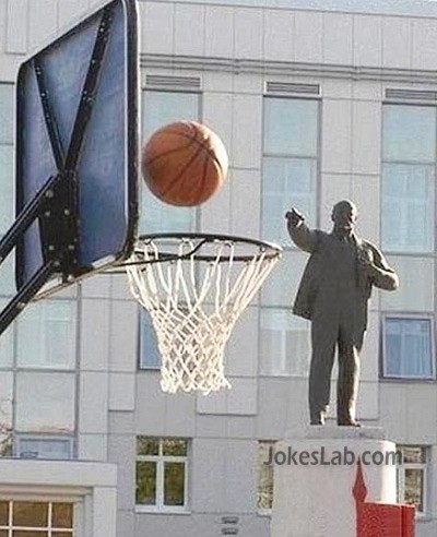 funny statue playing basketball
