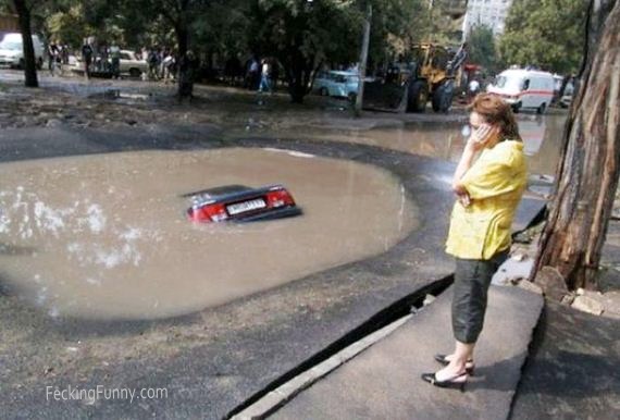 woman-parking-car-in-pond